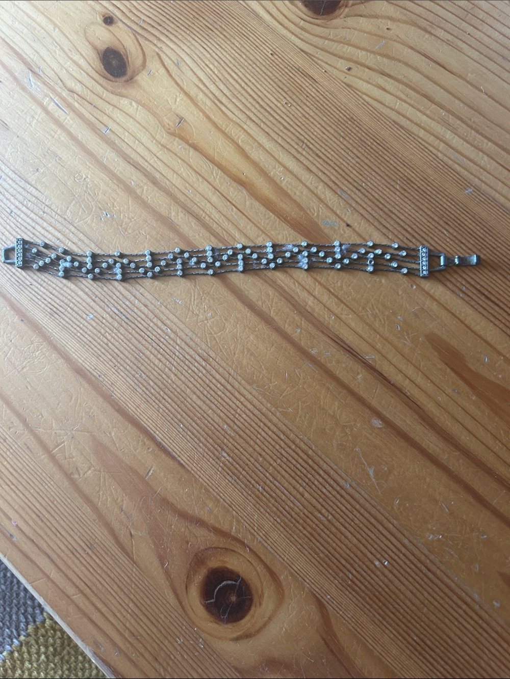 Vintage silver-tone bracelet with diamond pearls.